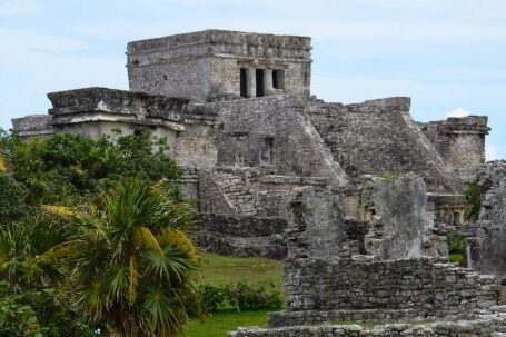 Archaeological Site - Gray Stone Building Near Palm Trees