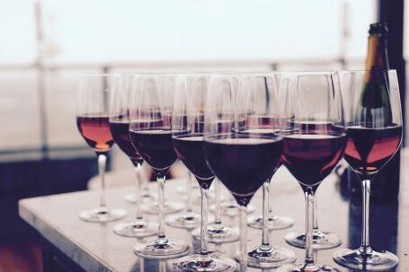 Wine Tasting - Wine Glass With Red Liquid on Black Table